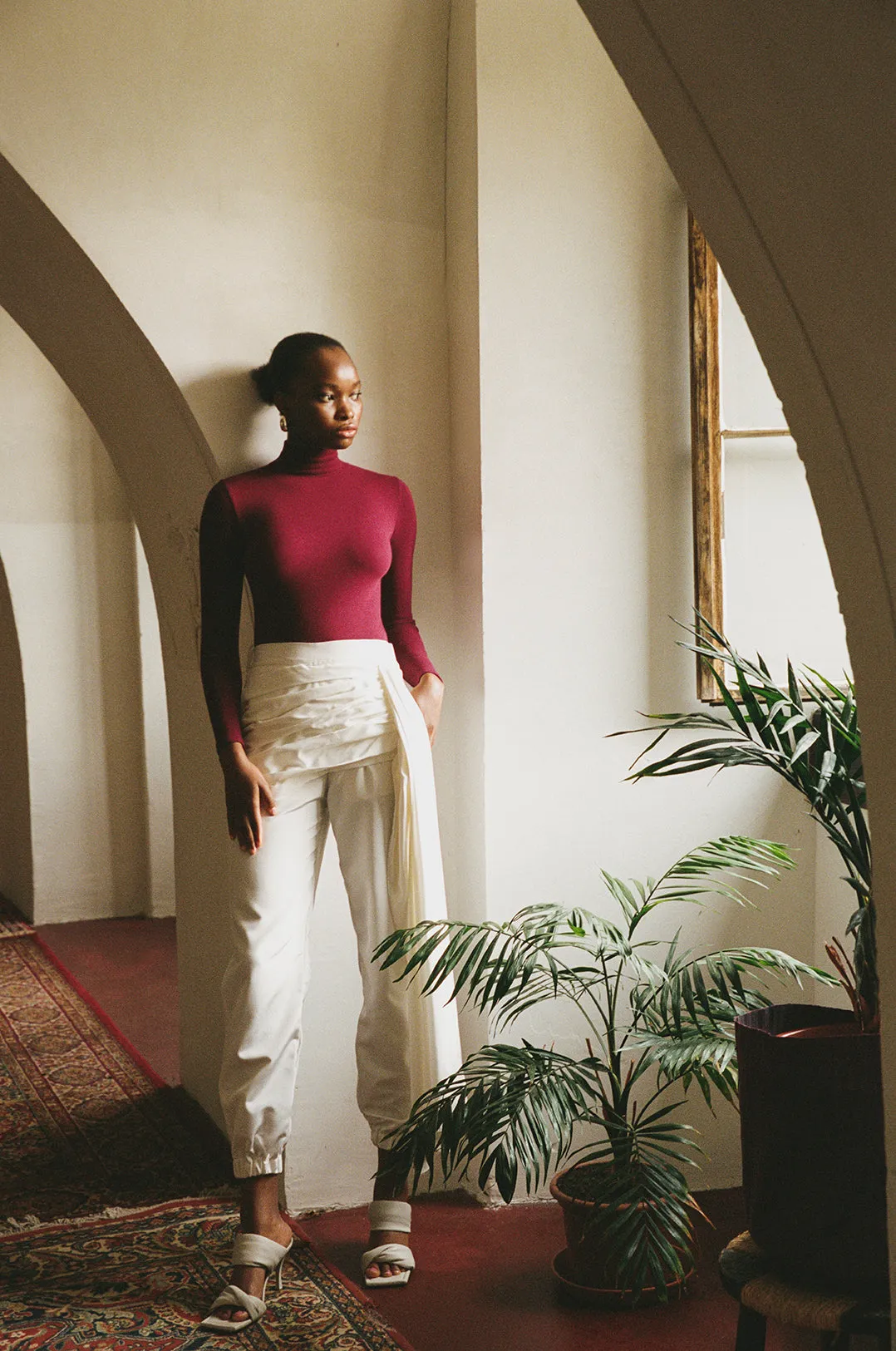 ALEXIOS Turtleneck Bodysuit in Burgundy